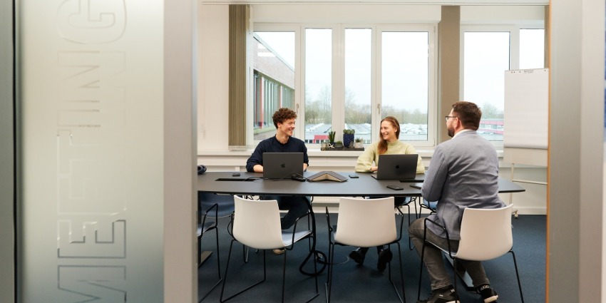 A group of people having a meeting